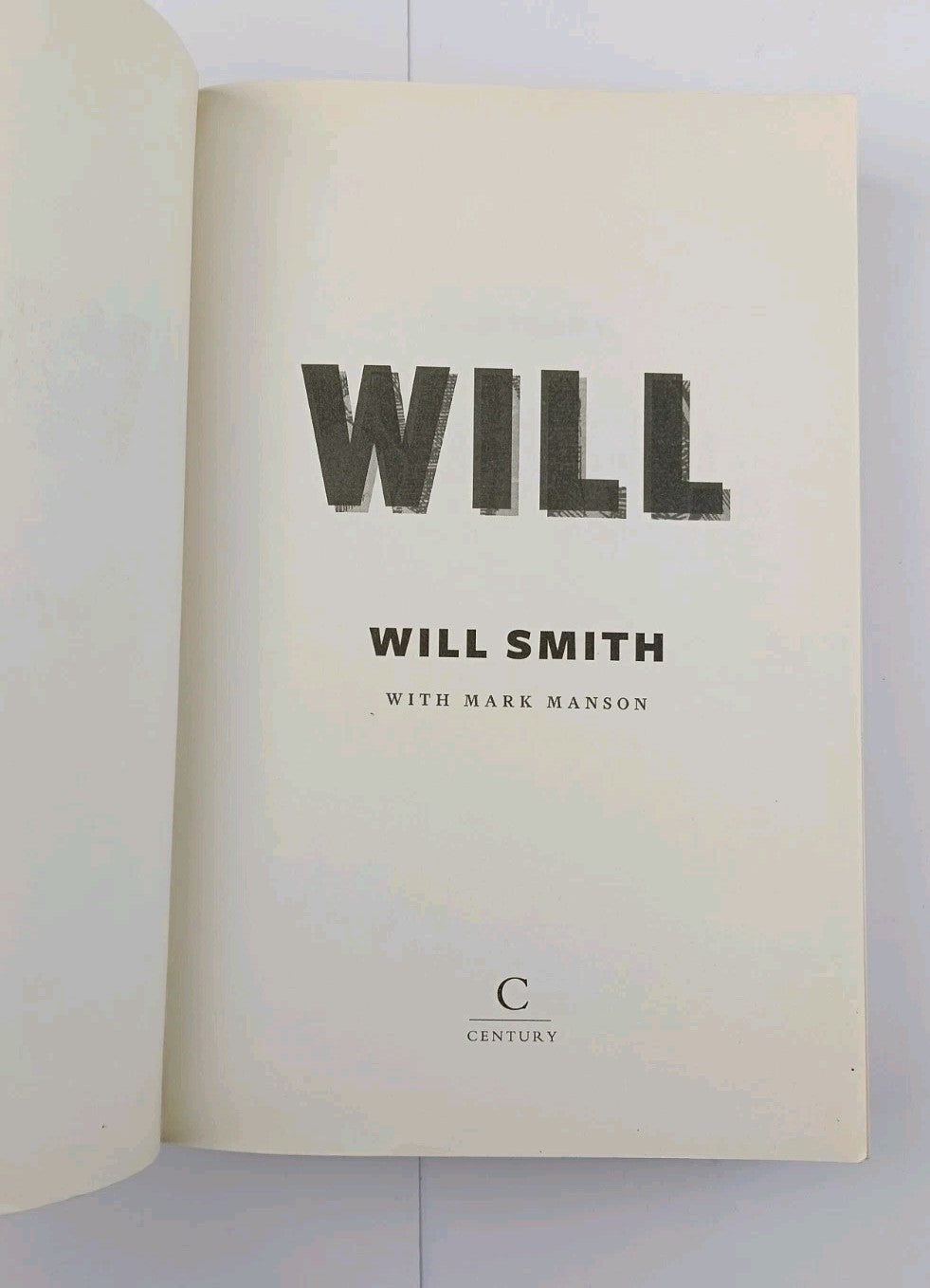 7689853